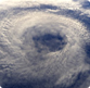 Overhead view of eye of a hurricane over the sea