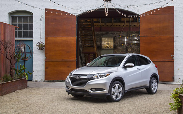 2016 honda HRV parked outside a barn