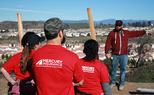 mercury emplyees listen to construction contractor