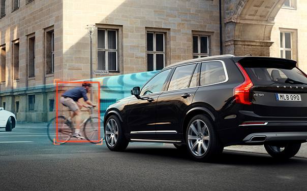 volvo suve showing off its pedestrian collision technology
