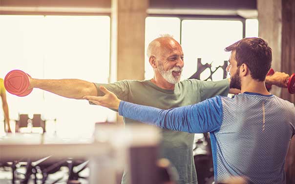 Personal Trainer working out with a client