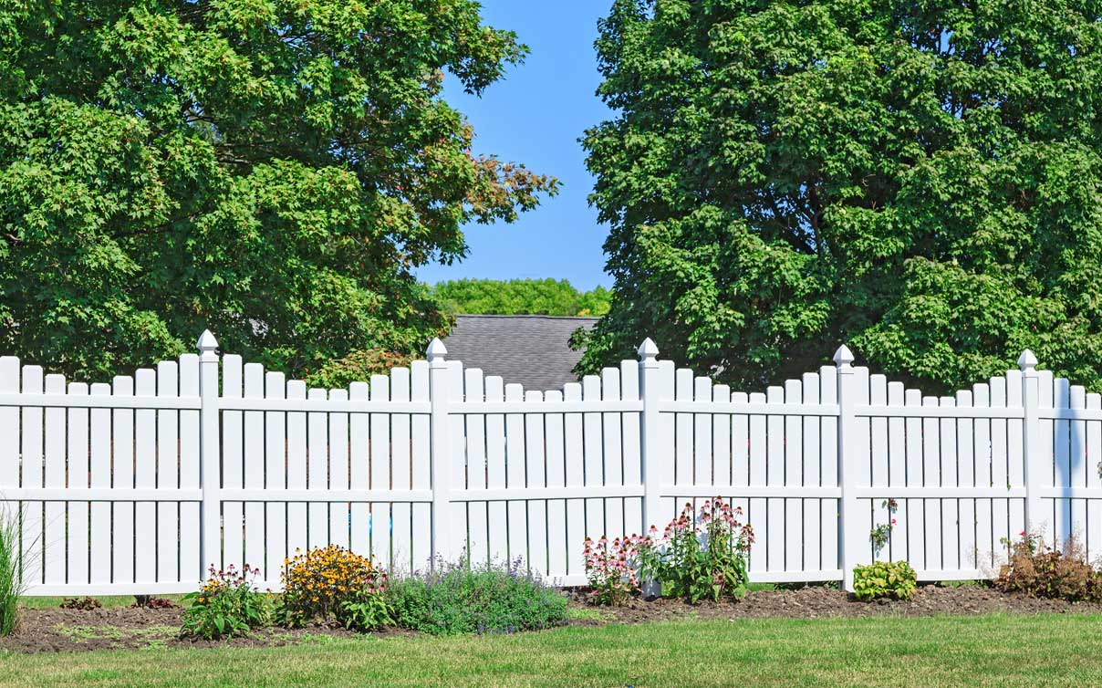 Backyard white fence
