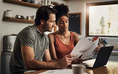 Family reviewing home insurance papers