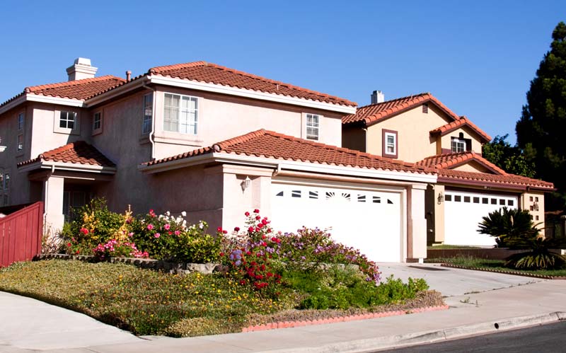 Nice house with roses in front yard