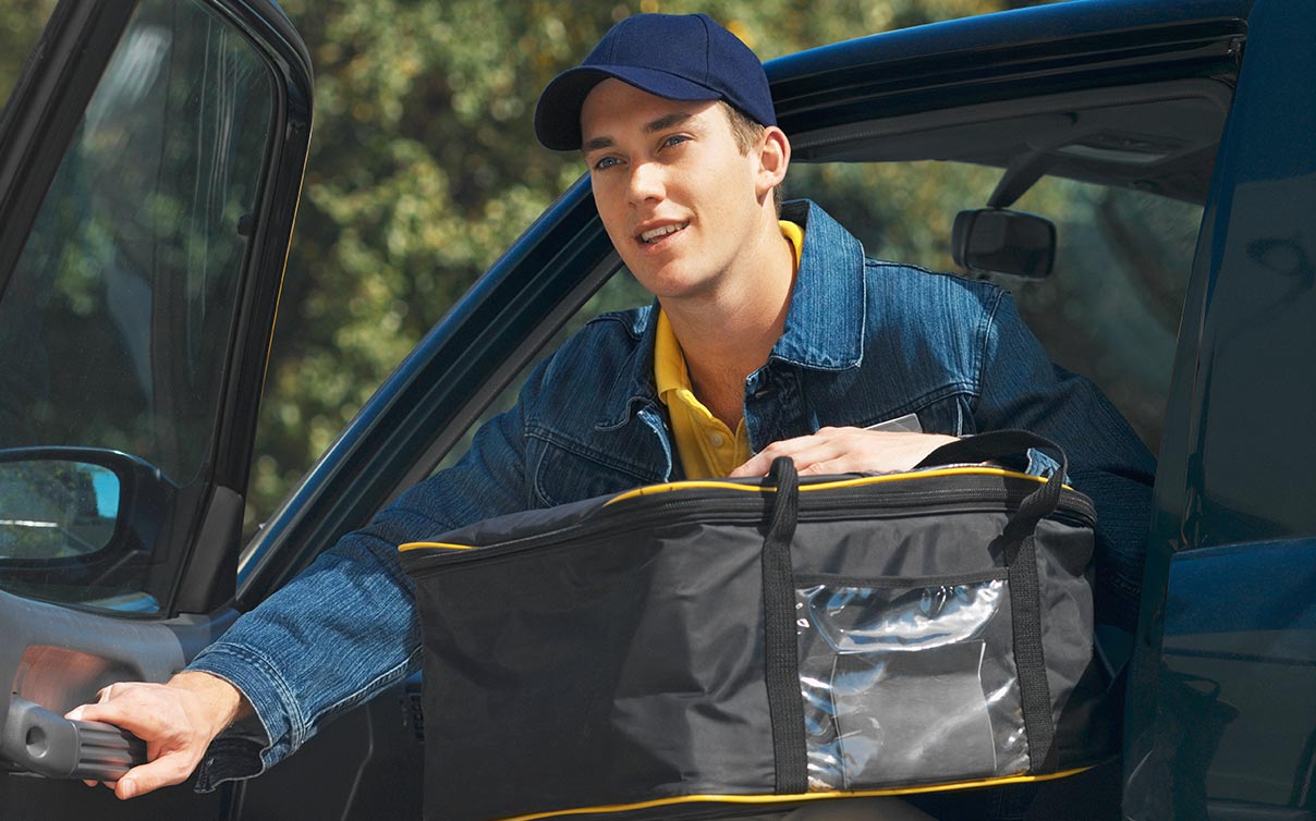 Young man delivering food