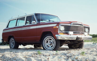 Classic truck parked on beach