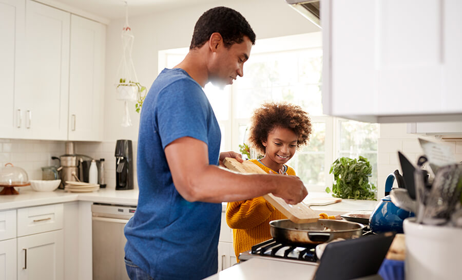 Cooking in kitchen with appliances