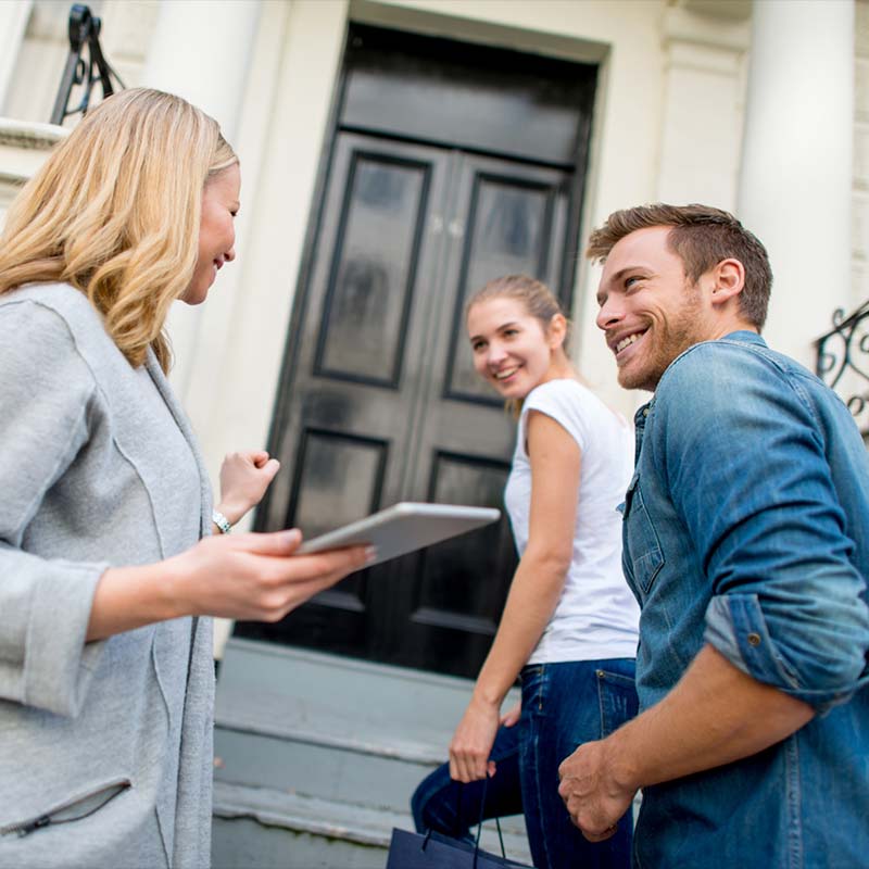 Happy couple renting a new house 