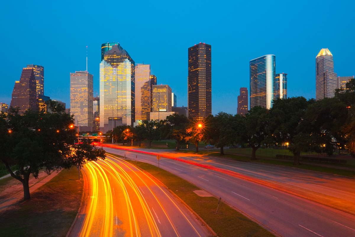 Houston downtown skyline at dusk on Allen Parkway
